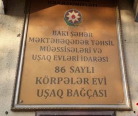 Məcburi köçkünlərlə bağça müdiri arasında çəkişmə